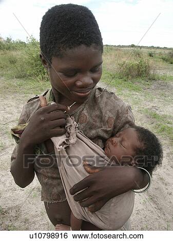 Stock Photograph - young, baby, zambia, person, people, woman. Fotosearch