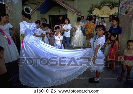 Stock Photography - young, party, preparation, santacruzan, girl, family. Fotosearch