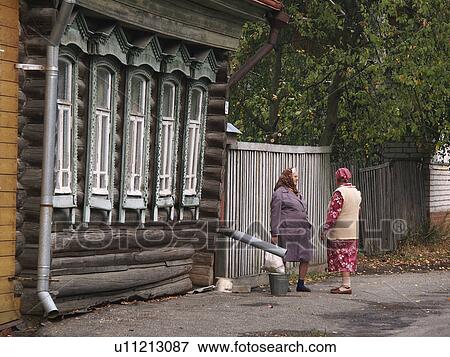 Stock Photo - 7924, house, women, home, person, people. Fotosearch