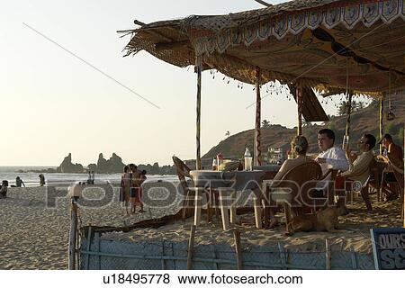 Stock Photo - arambol, people, tourists, india, person, beach. Fotosearch