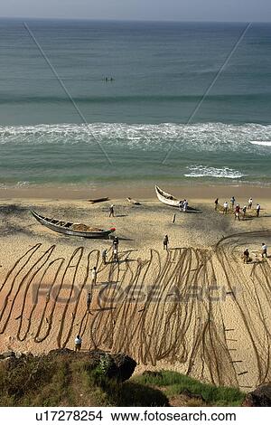 Picture - arranging, people, fishermen, india, person, beach. Fotosearch