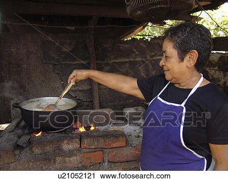 Stock Image - beans, people, cooking, nicaragua, person, woman. Fotosearch