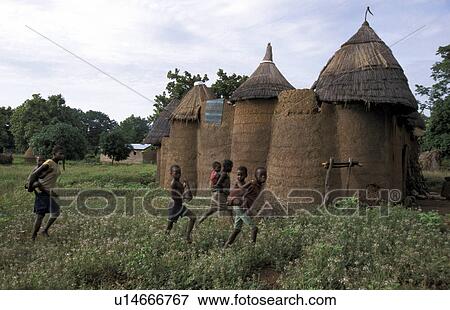 Stock Photo - benin, house, 7491, home, person, people. Fotosearch