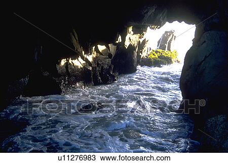 Stock Image - big, ocean, cave, comes, wave, water. Fotosearch