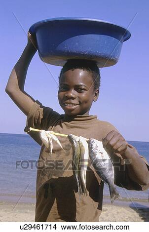 boy, person, 3525, children, fish, people View Large Photo Image Picture - boy, person, 3525, children, fish, people. Fotosearch