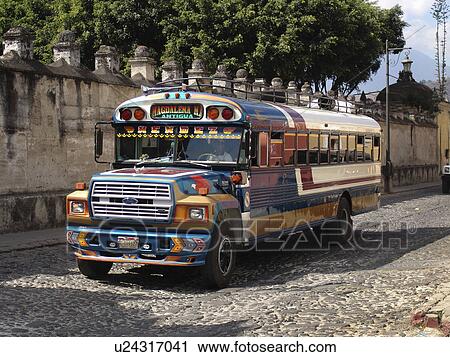 Stock Image - bus, person, chicken, typical, guatemala, people. Fotosearch