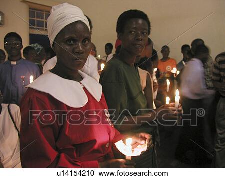 Stock Image - candlelit, people, zambia, birthday, person, party. Fotosearch