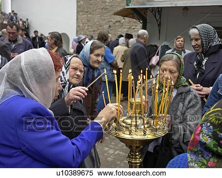 candles, people, lighting, russia, person, love View Large Photo Image Stock Photography - candles, people, lighting, russia, person, love. Fotosearch