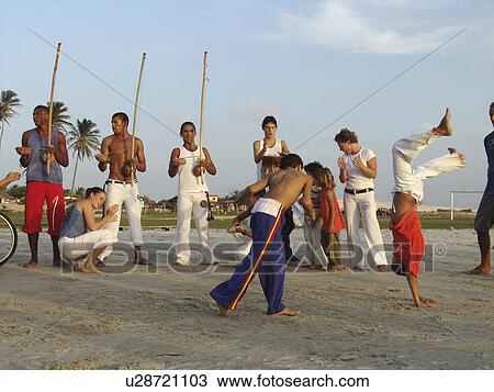 Stock Image - capoeira, people, brazil, person, sport, beach. Fotosearch