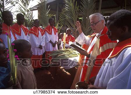 Picture - celebrating, tanzania, priest, catholic, maryknoll, 3917. Fotosearch