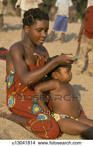 combing, people, mother, mozambique, person, baby View Large Photo Image Picture - combing, people, mother, mozambique, person, baby. Fotosearch