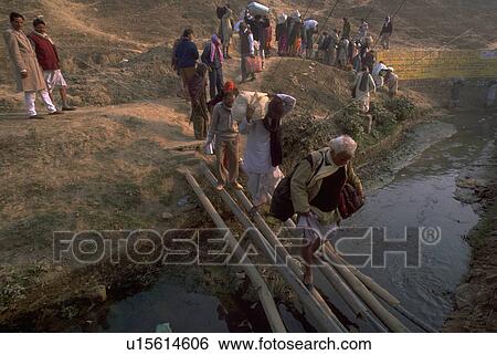 Stock Photograph - crossing, hindu, males, men, peasant, fitness. Fotosearch