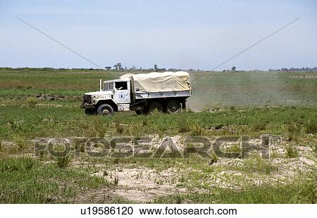 Stock Image - delivering, people, truck, zambia, person, food. Fotosearch