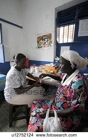Picture - dispensary, hand, community, kenya, person, people. Fotosearch