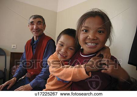 Stock Photo - elderly, person, orphans, mongolia, home, people. Fotosearch