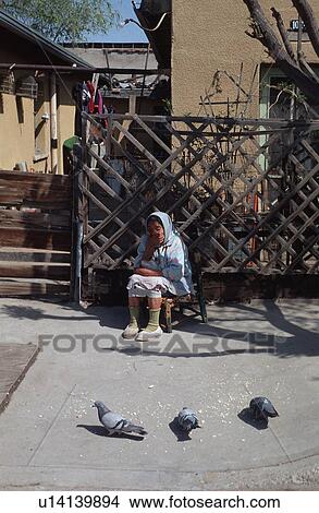 feeding, mexican, female, woman, hispanic, elderly View Large Photo Image Picture - feeding, mexican, female, woman, hispanic, elderly. Fotosearch