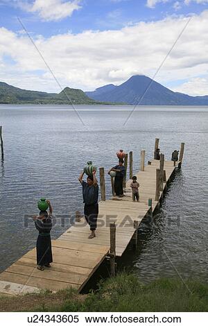 Stock Photography - females, people, guatemala, women, person, water. Fotosearch