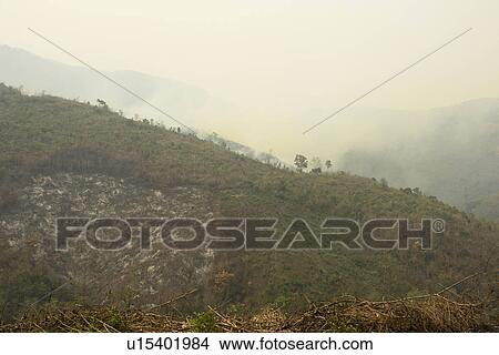 Picture - fires, person, burn, slash, laos, people. Fotosearch
