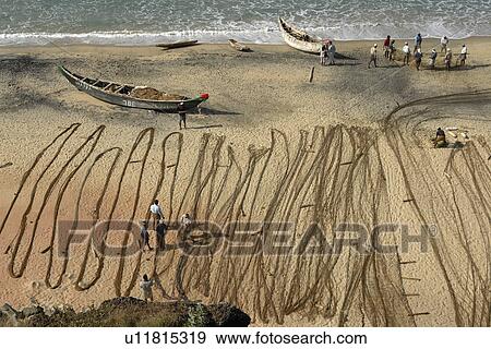 Stock Photo - fishermen, beach, india, person, people, business. Fotosearch