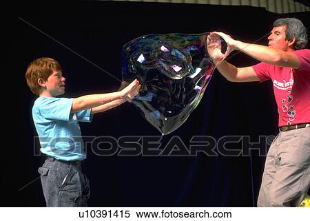 Stock Photography - giant, sport, bubbles, making, children, people. Fotosearch