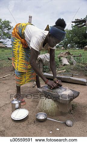 Stock Image - grinding, people, benin, 7564, person, woman. Fotosearch