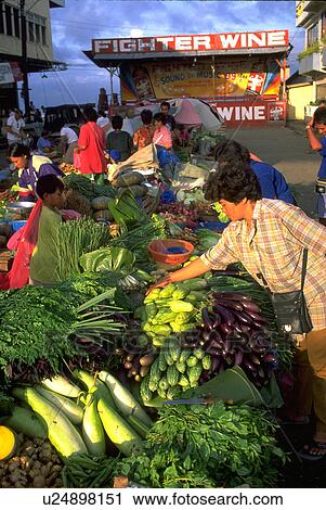Stock Image - iligan, shopping, market, outdoor, women, food. Fotosearch