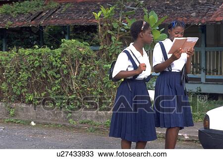 Stock Image - jamaica, jamaican, talking, walking, schoolgirls, school. Fotosearch