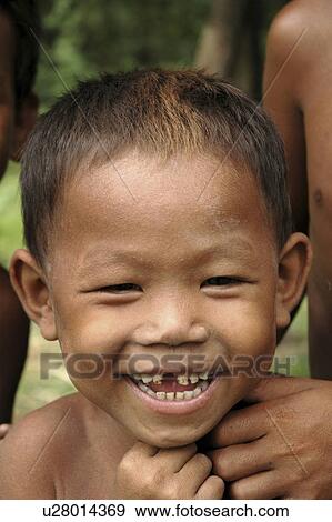 Stock Photo - kampong, child, boy, cambodia, person, people. Fotosearch