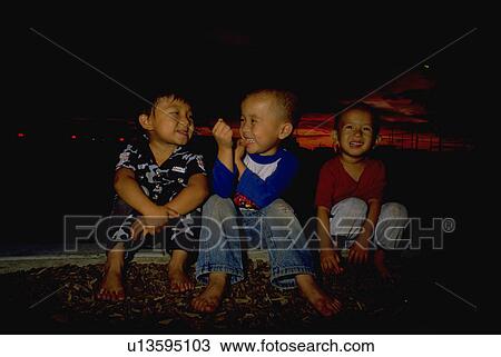 Stock Image - kids, children, laughing, boys, three, people. Fotosearch