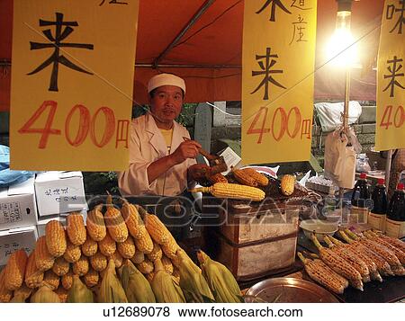Stock Photo - market, people, stall, japan, person, food. Fotosearch
