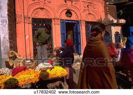 Stock Image - market, sharing, sellers, costumers, flowers. Fotosearch