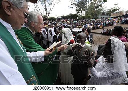 Stock Image - mass, party, kenya, person, people, wedding. Fotosearch