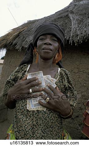Stock Image - microcredit, money, beneficiary, benin, person, people. Fotosearch