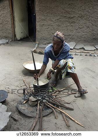 Stock Photo - mongu, people, cooking, zambia, person, woman. Fotosearch