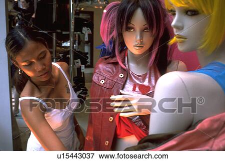 Stock Photo - montreal, shopping, shoppng, female, pattern, woman. Fotosearch