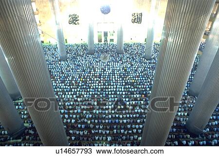 Stock Image - mosque, thousands, indonesian, pray, worshipers, love. Fotosearch