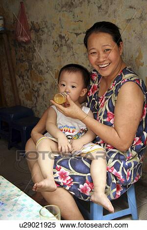mother, child, vietnam, kid, person, people View Large Photo Image Stock Photography - mother, child, vietnam, kid, person, people. Fotosearch
