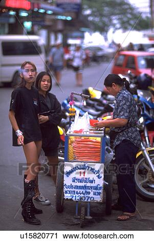 motorcycles, women, stand, snack, girls, food View Large Photo Image Stock Image - motorcycles, women, stand, snack, girls, food. Fotosearch
