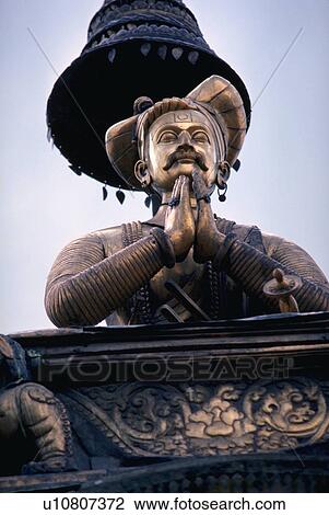 Stock Image - nepal, ornament, bhadgaon, statue, praying, temple. Fotosearch
