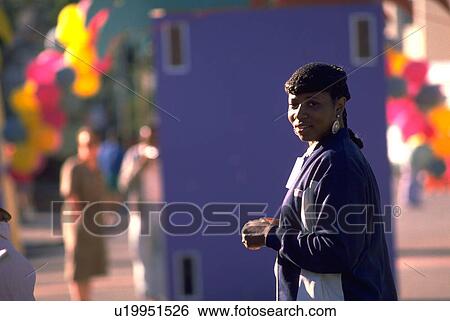Stock Photograph - oakland, people, lake, festival, female, woman. Fotosearch