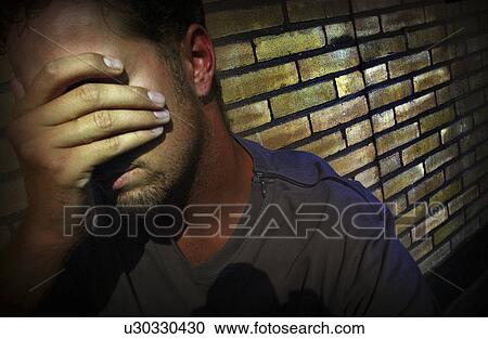 Stock Image - pain, male, despair, depression. Fotosearch