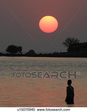 palolem, person, sunset, india, sun, people View Large Photo Image Stock Image - palolem, person, sunset, india, sun, people. Fotosearch