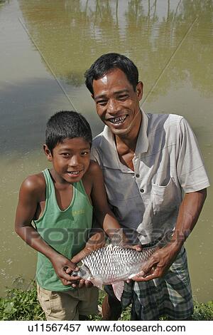 people, children, fish, person, food View Large Photo Image Stock Photo - people, children, fish, person, food. Fotosearch