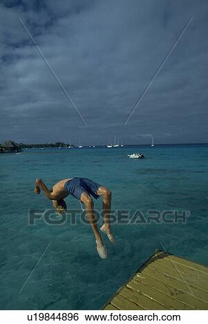 Stock Photograph - people, ocean, diving, male, water. Fotosearch