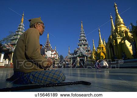Stock Photo - people, temple, shwedagon, male, party. Fotosearch