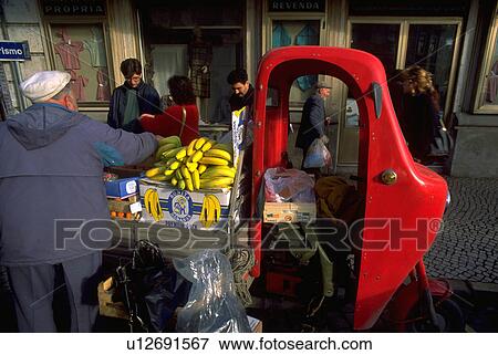 Stock Photo - people, vendor, street, fruit, business. Fotosearch