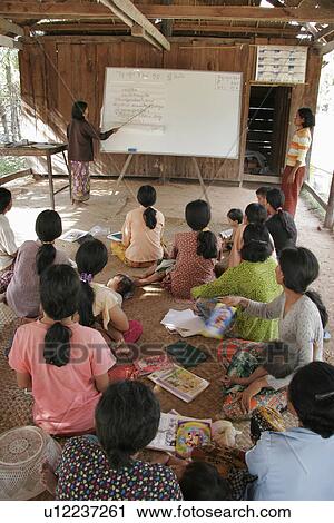 Stock Image - person, literacy, cambodia, school, people. Fotosearch