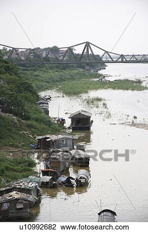 Stock Image - person, red, bridge, vietnam, people. Fotosearch