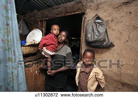 Stock Image - person, woman, child, house, people, family. Fotosearch