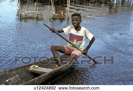 pirogue, person, paddling, boy, benin, people View Large Photo Image Stock Image - pirogue, person, paddling, boy, benin, people. Fotosearch
